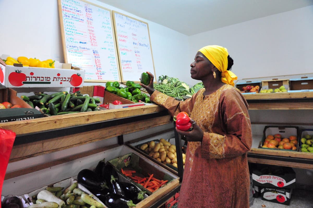Community members at the Village of Peace market
